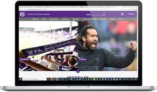 atlantis dx - EVENTIM SPORTS: Online-Shop-Plattform für Merchandising mit Magento 2 Bildmontage: Laptop frontal mit geöffneter Startseite einer Merchandising-Shops