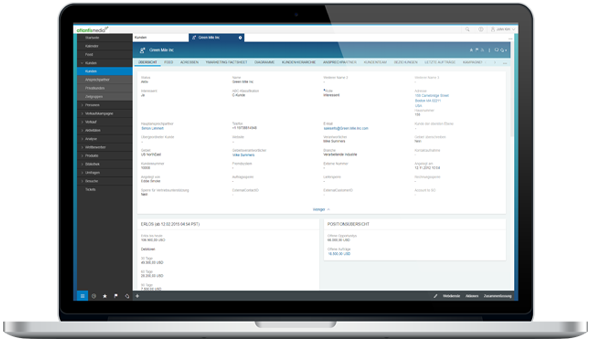 Abbildung eines geöffneten Laptops, auf dem Monitor werden verschiedene Daten aus SAP Sales Cloud angezeigt