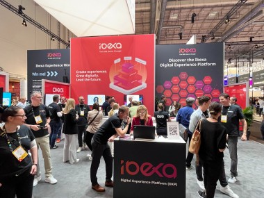 Photo: Crowd at the Ibexa stand at OMR 2023
